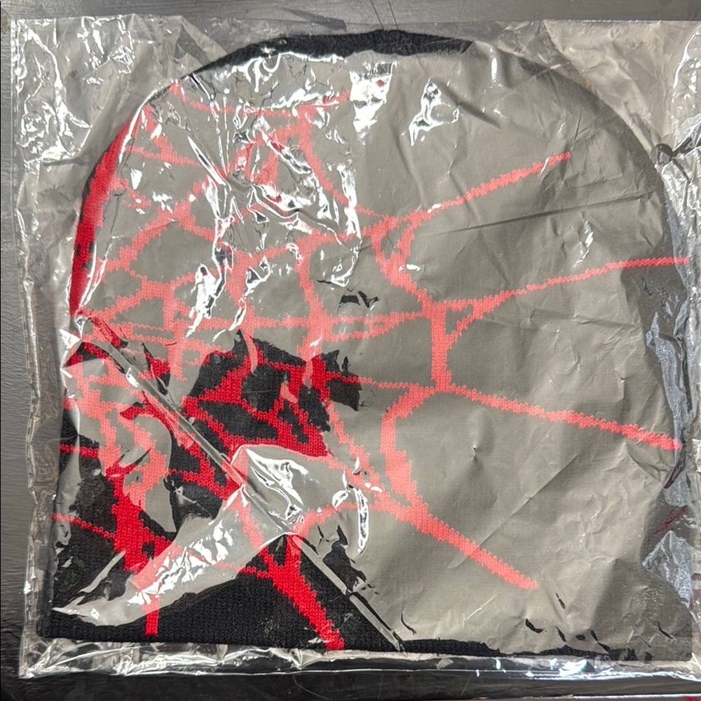 Y2K Spider Web Pattern Beanies. One red and one white.